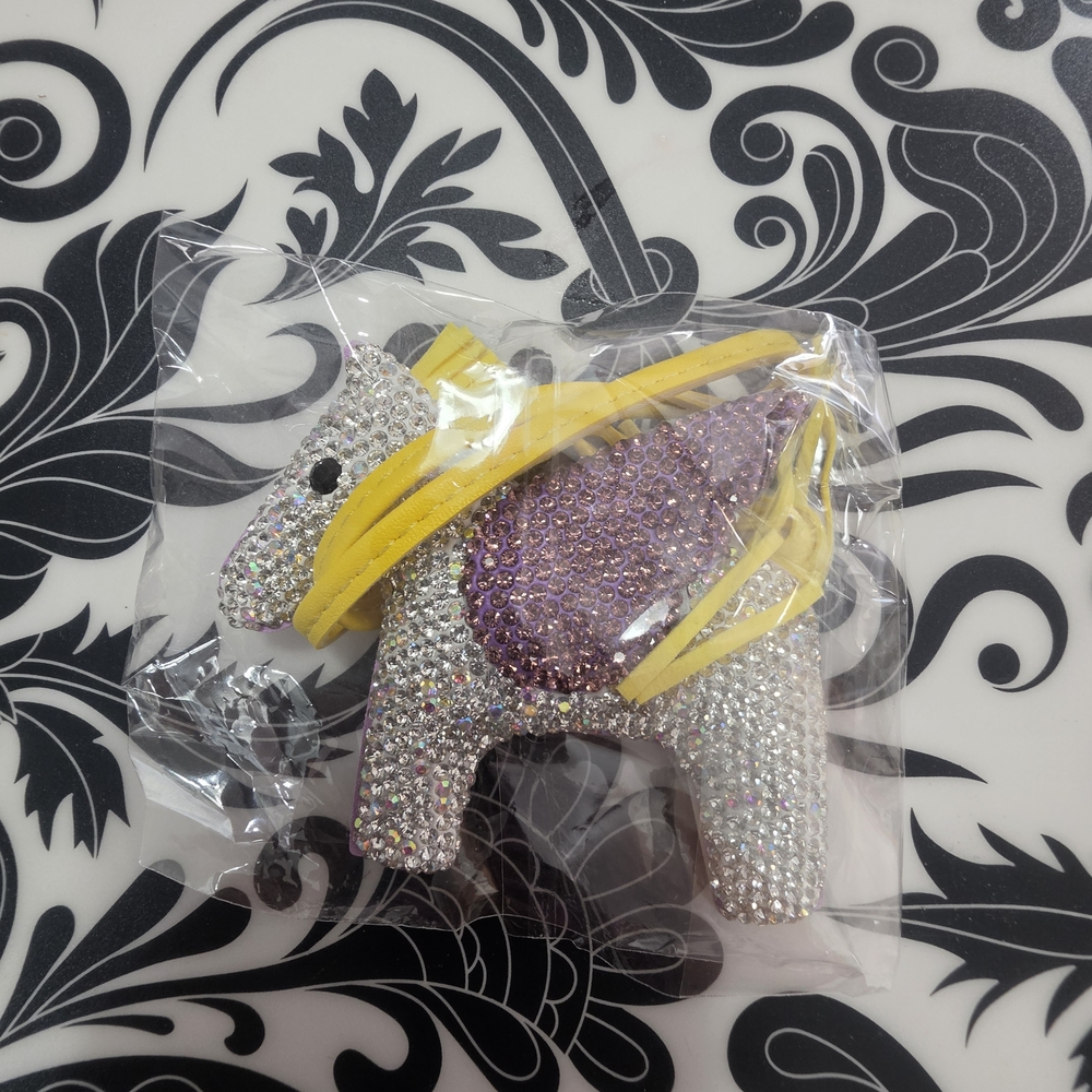 Sparkling Stone Pony Bag Charm with Yellow Tassels